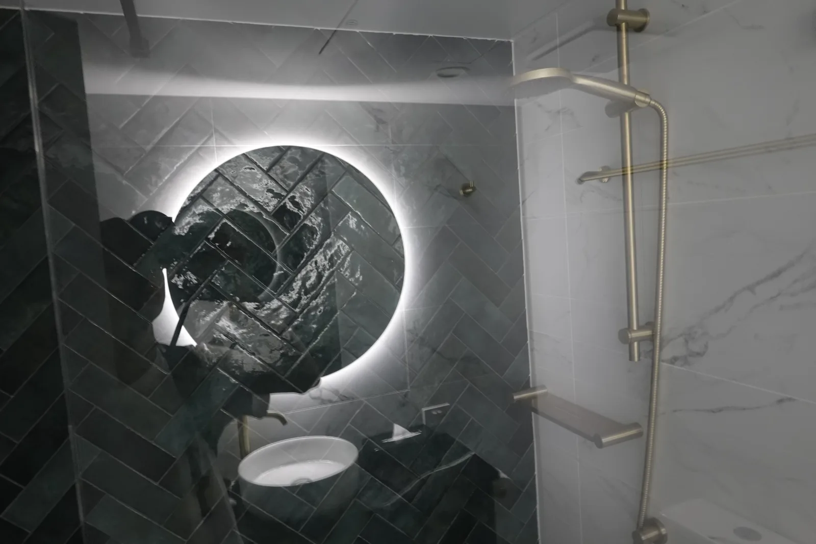 Walk-in shower in our room at The Benson Hotel Cairns