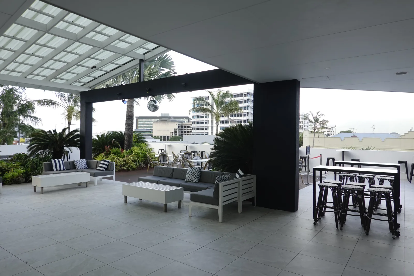 Outdoor terrace seating at The Benson Hotel Cairns
